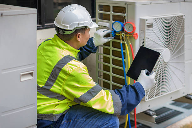 Professional Heat Pump Repair technician working in Douglass, KS